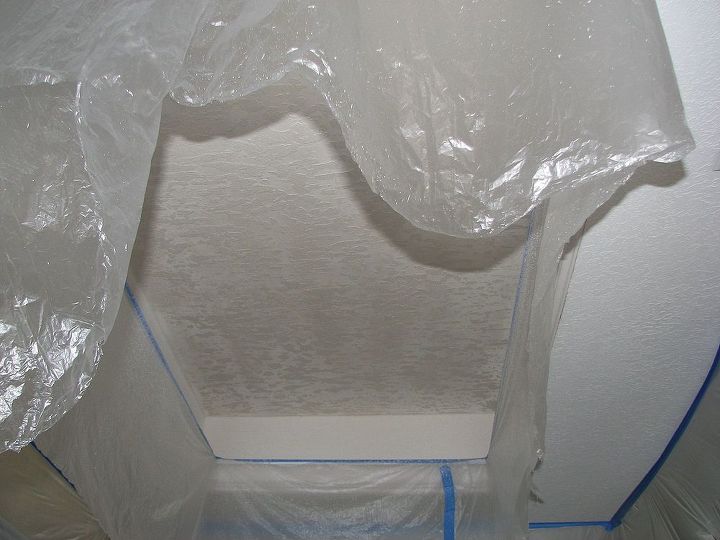 what to do with that 1980 s style kitchen lighting, After the drywall was repaired It was time to apply a new and more modern texture called Skip Trowel