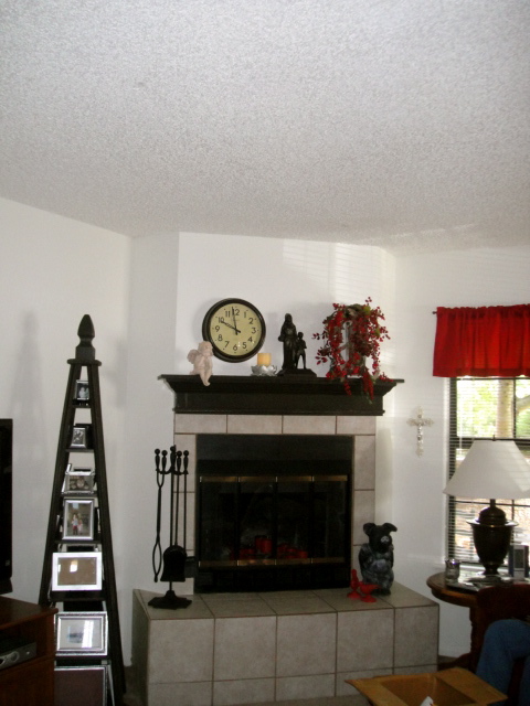 living room mantle before and after, home decor, living room ideas, storage ideas, Mantle after I built the mantle and photo tower for Mom s apartment
