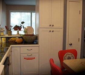 my 1940 s inspired kitchen renovation, home improvement, kitchen design, Pantry wall Opening lets in all the light from long front windows Tall cabinet is pantry with roll out shelves Lower cab had roll out trash and recycling bins Broom closet on right