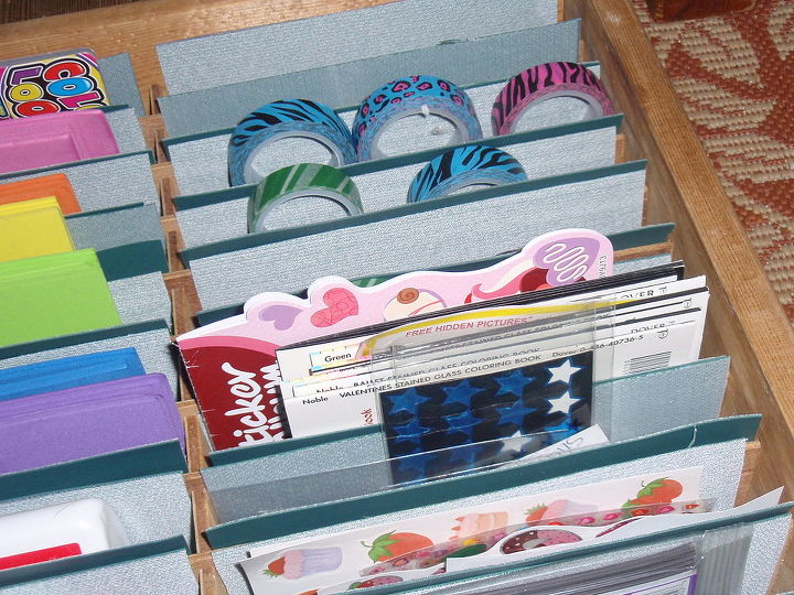 thrift store slotted box becomes craft supply center, craft rooms, repurposing upcycling, storage ideas, What s in here Glue sticks fun foam washi tape stickers bottles of glues rubber stamps and lots more