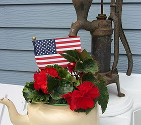 my potting bench has gone red white blue, flowers, gardening, outdoor living, Here is a bright red begonia