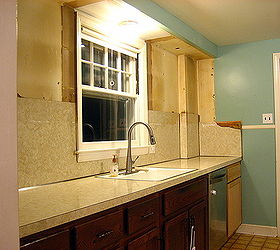 removing old laminate backsplash, kitchen backsplash, kitchen design, painting, shelving ideas, Cabinets gone laminate backsplash is next