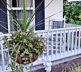 how to mount flower baskets onto wooden posts, curb appeal, diy, flowers, gardening, how to, repurposing upcycling, woodworking projects, The flowers are at a height that my mother can enjoy them while she s sitting on her front porch