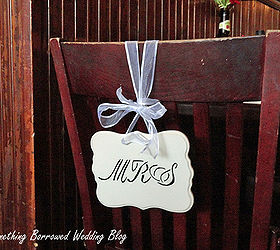 diy rustic wedding accessories, crafts, repurposing upcycling, The sign were simply made by stencil painting onto wood plaques Two holes were drilled into the tops to weave the ribbon through for hanging