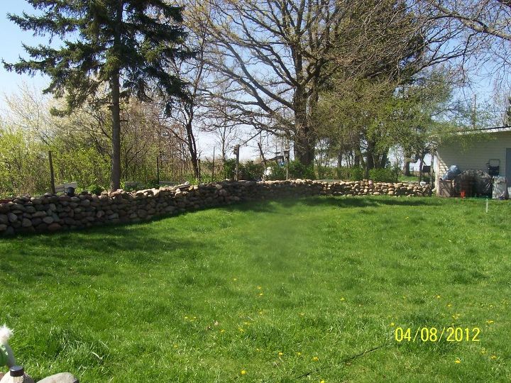 my rock garden, flowers, gardening, landscape, A faraway view of one half of the rock wall