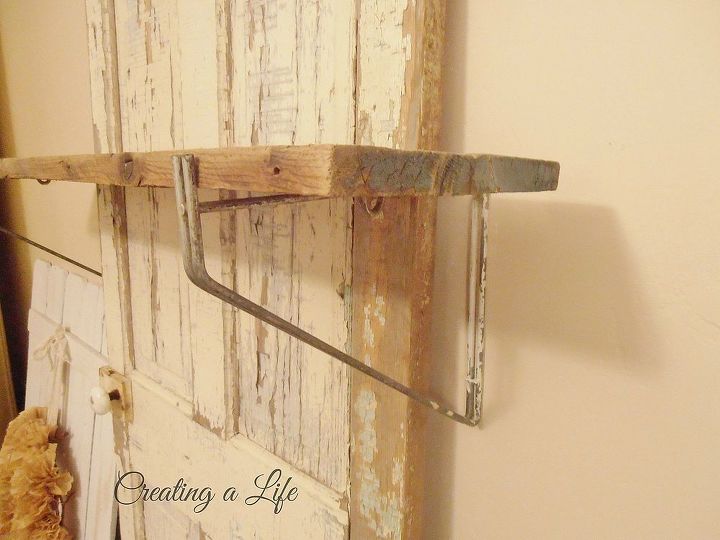 vintage door valentine mantel, home decor, repurposing upcycling, seasonal holiday decor, I used some spare metal brackets to hold the rustic board mantel in front of an old door