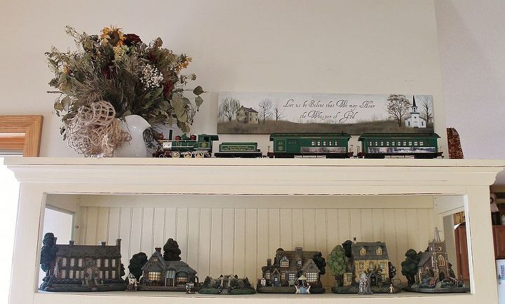 a country christmas, christmas decorations, seasonal holiday decor, These are now treasured collectibles Thomas Kinkade s Hawthorne Village and Christmas Train We love to turn it on at night and enjoy it s quaint beauty