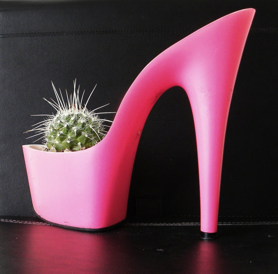 plant fashion 7 glamorous potting ideas, container gardening, flowers, gardening, succulents, Shoes Got an old shoe with a hole or two in its sole Sounds like a planter with pre made drainage holes to us