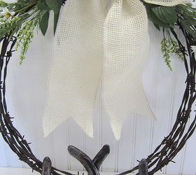barb wire and horseshoe wreath, crafts, repurposing upcycling, seasonal holiday decor, wreaths, I added a white burlap bow