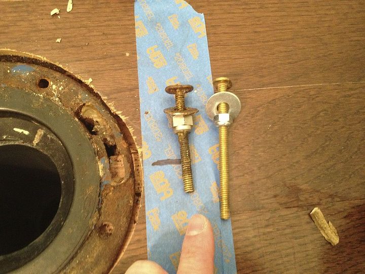 fix a moving of leaking toilet bowl before the holidays, home maintenance repairs, how to, Use extra long closet flange bolts with a spacer