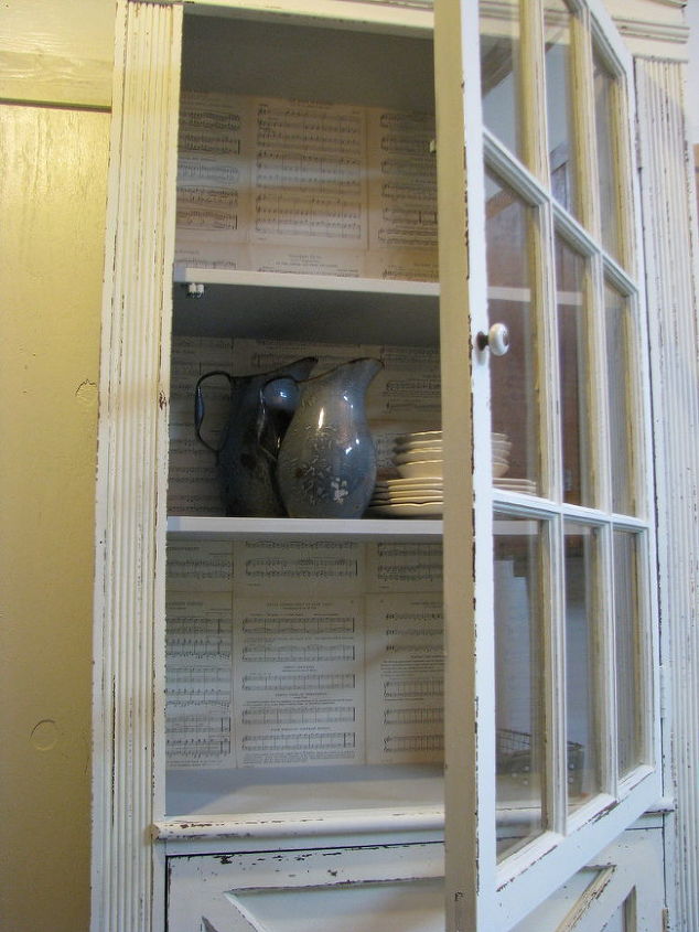 salvaged door into a cabinet, kitchen cabinets, painted furniture, repurposing upcycling, To finish it off I lined the inside with vintage sheet music