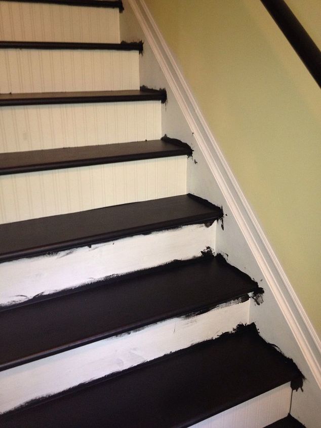interior stairs makeover, Four coats of porch and floor paint three coats of polyurethane on stair treads Adding beadboard wallpaper on risers Then painted risers and trim Added an additional piece of trim between riser and tread
