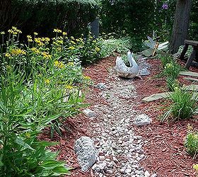 my secret garden in july, flowers, gardening, hibiscus, perennials, raised garden beds, dry creek bed so pleasant