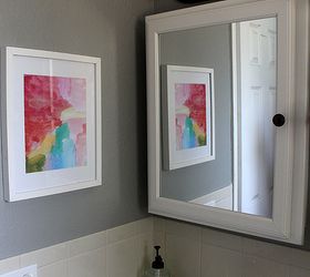 70 bathroom makeover, bathroom ideas, home decor, repurposing upcycling, shelving ideas, small bathroom ideas, Add color to a neutral room by framing vibrant paintings This watercolor printable was free
