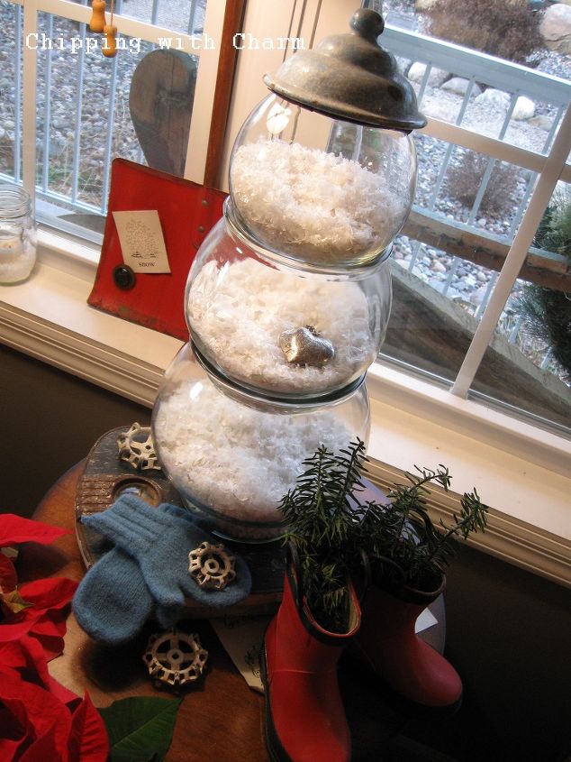 a fish bowl snowman, seasonal holiday d cor, Fish bowls in graduated sizes filled with snow and stacked