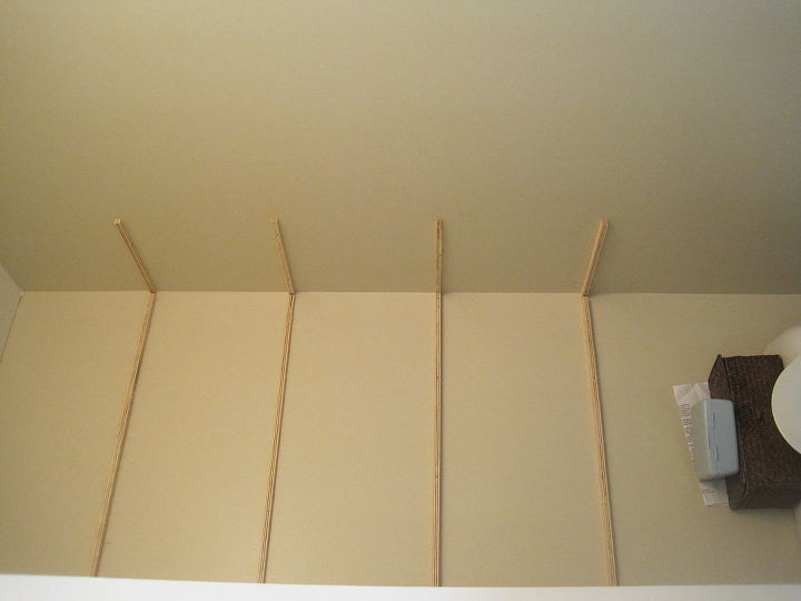 storage in small half bathroom, bathroom ideas, diy, how to, shelving ideas, storage ideas, urban living, We began by making wooden braces nailing them into the wall