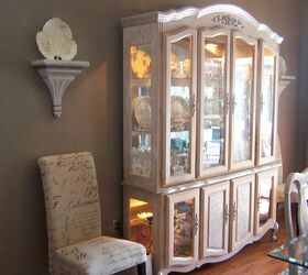my dining room redo with reused furnishings, dining room ideas, home decor, repurposing upcycling, The hutch from Craig s list white washed with silver accents by a terrific artist also found on Craig s list