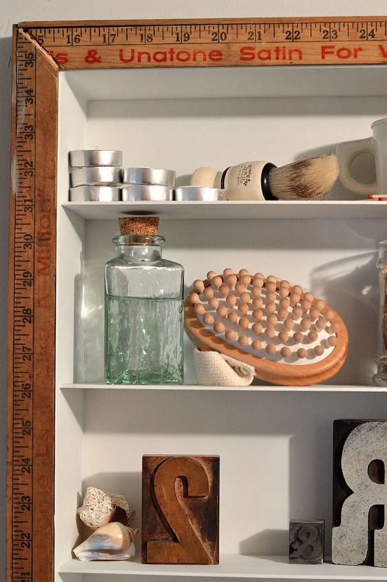 medicine cabinet makeover using vintage yard sticks, home decor, kitchen cabinets