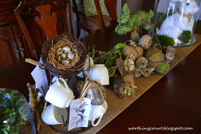 mi centro de mesa de pascua de arpillera y vintage, Un nido de huevos de imitaci n llena el espacio de la parte superior del rbol de tazas
