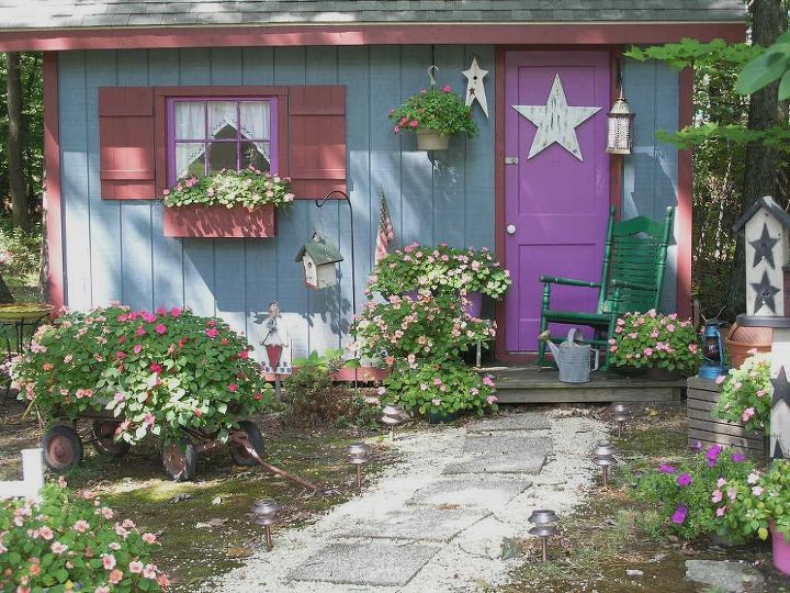 my fairy tale style shed, flowers, gardening, outdoor living, Here is the shed in full bloom See what Miracle Grow can do I love that stuff