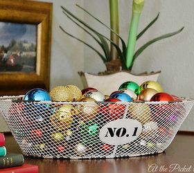 from christmas to winter in a few simple steps, fireplaces mantels, seasonal holiday d cor, A wire basket on a shelf is filled with colorful ornaments for Christmas