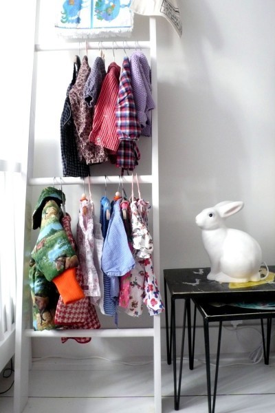 6 new uses for an old ladder, home decor, repurposing upcycling, Hang kids clothes This is a great tip for homes that have limited closet space The space between ladder rungs is the perfect spot for small shirts and sweaters