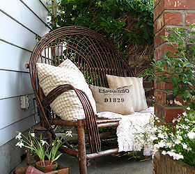 a collection of all my outdoor sitting areas, home decor, outdoor living, patio, porches, This little area is by my front door It s just under an overhang so the spot was small But who s to say you can t jam a cute chair anywhere you wish