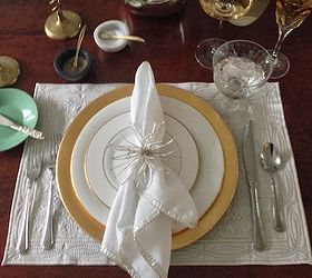 table top ideas for the holidays, seasonal holiday decor, Replacing the idea of a table cloth for place mats and using a few different pieces gave the table more of an upscale urban feel