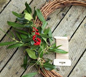 making a fresh evergreen wreath, crafts, doors, flowers, gardening, hydrangea, seasonal holiday decor, wreaths, Using the twine tie the bunch to the grapevine wreath