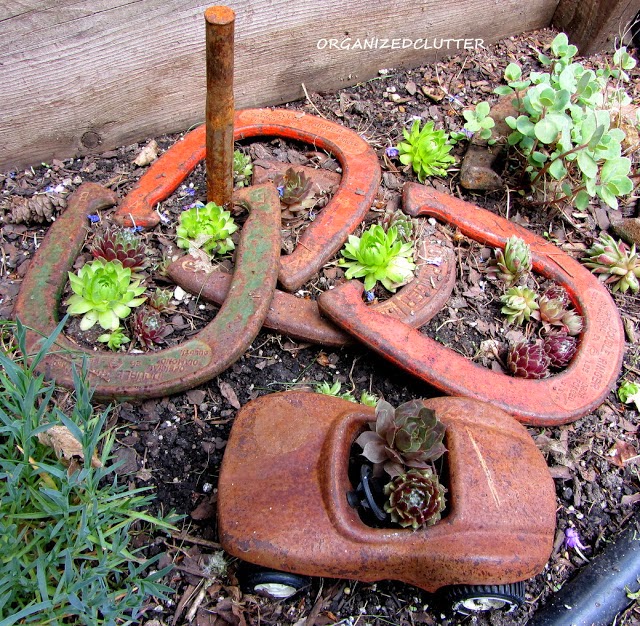 the yard gardens patio of a junk collector, gardening, outdoor living, patio, repurposing upcycling, Toys games