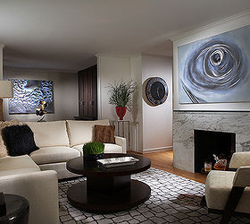 living room design tips 1, fireplaces mantels, home decor, living room ideas, Don t Forget the Accents No room is complete without striking accent pieces and coordinating decor To finish off a room Candice says to add a contemporary coffee table a spacious area rug and eye catching pieces of art Designer Jo