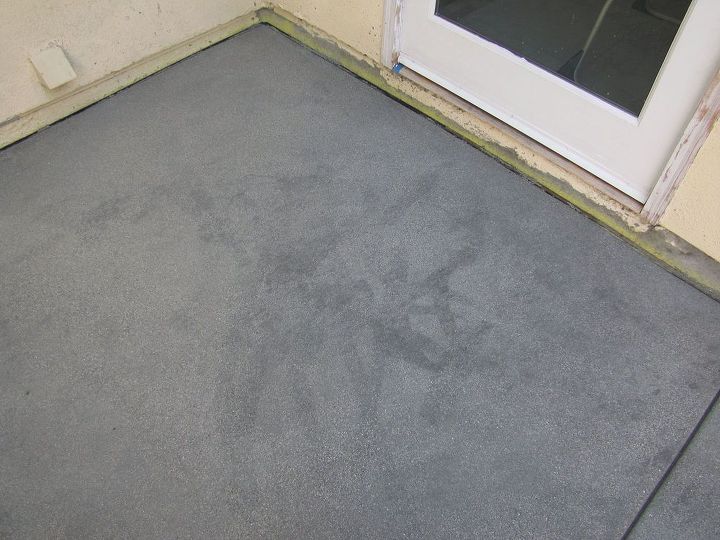 newly poured concrete has dark spots and streaks throughout help