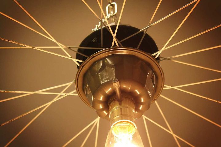 repurposed upcycled bicycle rim pendant hanging light, lighting, repurposing upcycling, The cake molds house all the guts that brought electricity to this rim