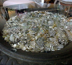 diy garden urn turned coffee table, home decor, painted furniture, repurposing upcycling, shabby chic, I filled it with bone and mother of pearl buttons Be sure to plug up any drain holes so things don t fall out You can also use something under the buttons or other filler if you don t have enough I used brown paper grocery bags