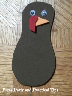 thanksgiving turkey place cards, crafts, seasonal holiday decor, thanksgiving decorations, For this craft you need brown craft foam goggle eyes and pipe cleaners of various colors Start the craft by gluing the face on a main body piece of the turkey
