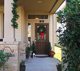 join me out on the front porch to see my outdoor christmas decor, outdoor living, porches, seasonal holiday decor, wreaths, Two strands of faux garland were fluffed and wound together for fuller look