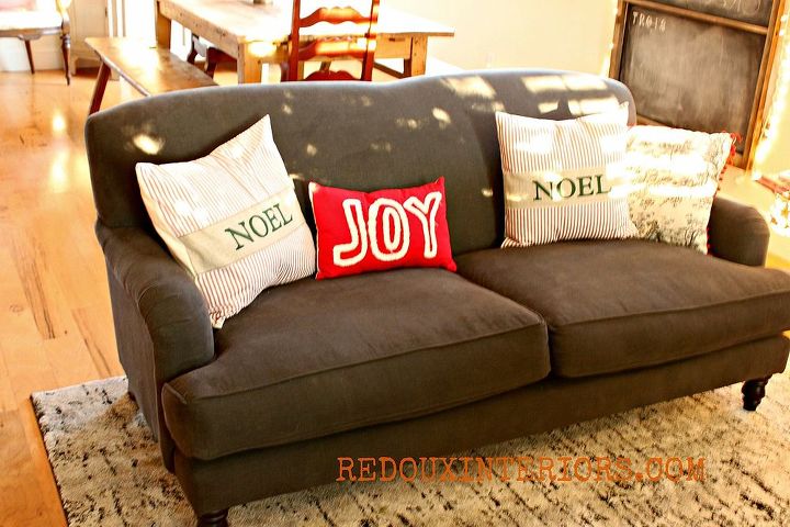 keeping it real holiday home tour, christmas decorations, seasonal holiday decor, Grown up couch for a grown up room but it still has a sense of humor