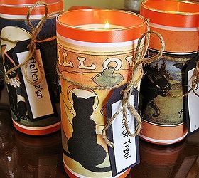 easy and cheap halloween ideas, crafts, halloween decorations, repurposing upcycling, seasonal holiday decor, Vintage Halloween postcards free graphics included and Dollar Tree candle holders make fun and easy Halloween candles Find directions here