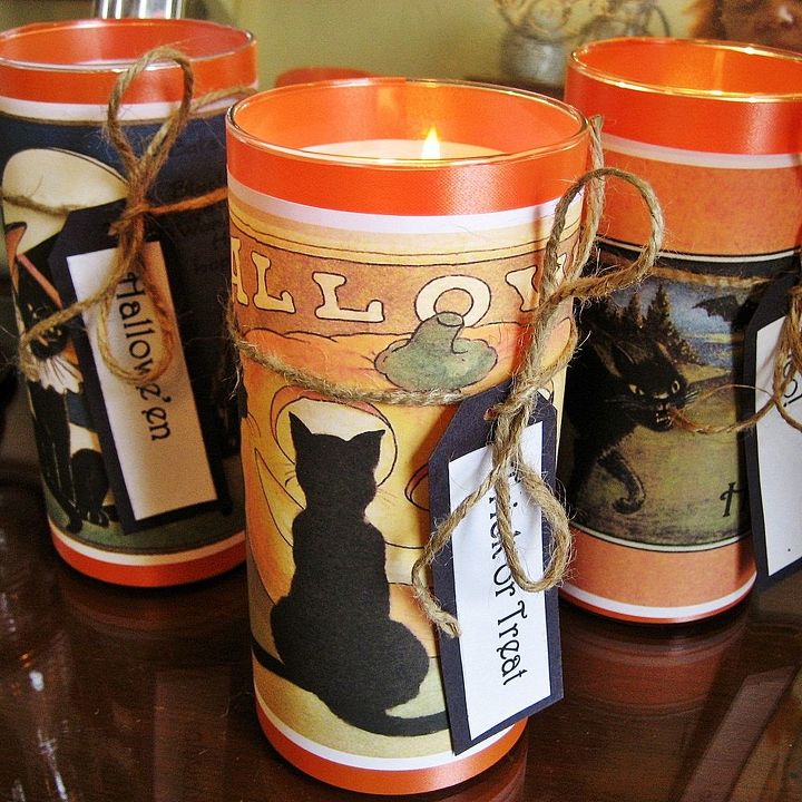 easy and cheap halloween ideas, crafts, halloween decorations, repurposing upcycling, seasonal holiday decor, Vintage Halloween postcards free graphics included and Dollar Tree candle holders make fun and easy Halloween candles Find directions here