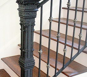 use an antique garden fence post as an indoor newel post, repurposing upcycling, stairs, antique iron post repurposed as an indoor newel post