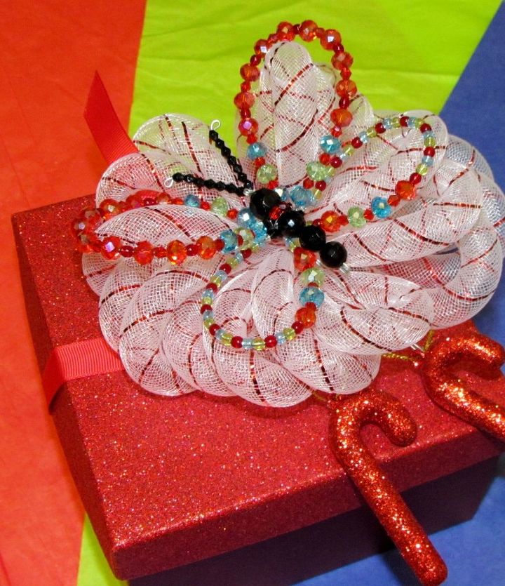 estaca de jardn mariposa de cristal, Puedes utilizar el mismo m todo doblando el alambre m s cerca del cuerpo y utilizarlo como adorno para envolver regalos