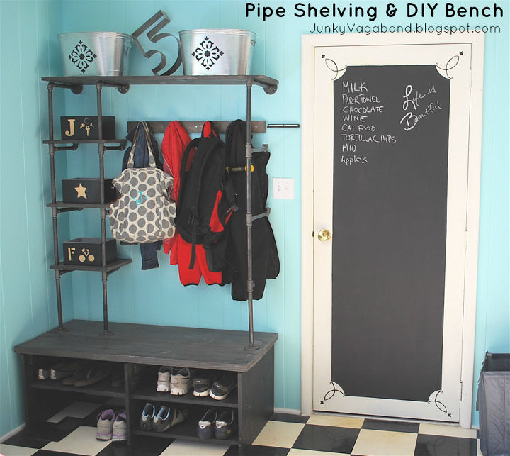 pipe shelves and diy bench for a mini mudroom, chalk paint, laundry rooms, organizing, shelving ideas, An industrial look with pipe shelving and a chalkboard door