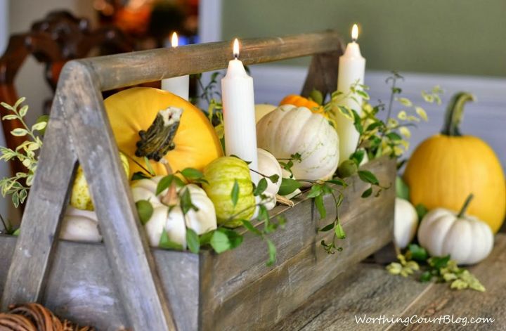 make a fast and easy rustic and elegant fall centerpiece, repurposing upcycling, seasonal holiday d cor, Wooden toolbox filled with white and yellow pumpkins candles and greenery