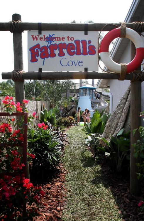 my yard goes disney farrell, outdoor living, pool designs, Guests to the Farrell s renovated backyard are greeted by a welcome sign