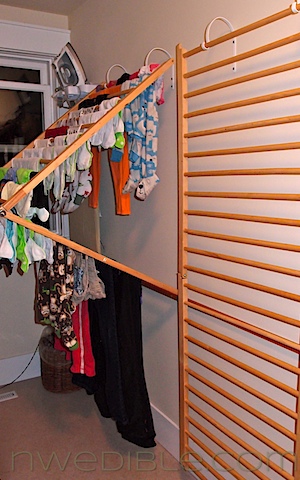 diy wall mounted clothes drying rack, repurposing upcycling, urban living, The rack hinges to fold out in the center but lay flat when not in use