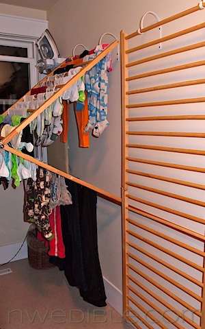 diy wall mounted clothes drying rack, The rack hinges to fold out in the center but lay flat when not in use