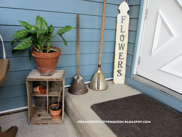 my covered front porch patio, outdoor living, patio, porches, House plants come outdoors This one is a peace lily