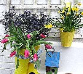 spring is busting out all over, container gardening, flowers, gardening, rain boots filled with tulips statice on the potting sink