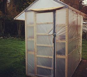 150 greenhouse, diy, gardening, homesteading, Here is the outside of the completed greenhouse It not rests on our back porch We have a light we run into it but so far we havent needed to use it