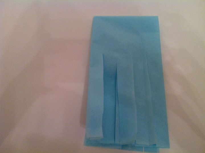 how to host a baby shower day three tissue paper bunting, crafts, home decor, Cut slits 3 4 of the way up